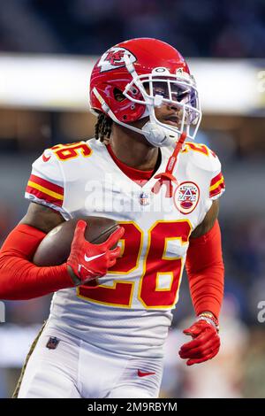 KANSAS CITY, MO - NOVEMBER 06: Kansas City Chiefs safety Deon Bush (26)  hits Tennessee Titans running back Hassan Haskins (25) on November 6th,  2022 at GEHA field at Arrowhead Stadium in