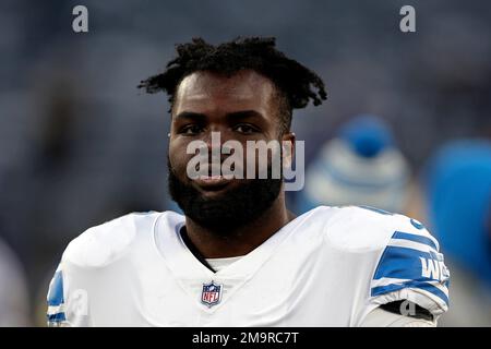 Detroit Lions guard Kayode Awosika (74) reacts at the conclusion of an NFL  football game against the New England Patriots, Sunday, Oct. 9, 2022, in  Foxborough, Mass. (AP Photo/Greg M. Cooper Stock