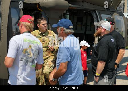 US Army National Guard soldier talks with visitors during the Armed Forces Weekend event at Indianapolis Motor Speedway May 21, 2022. Stock Photo