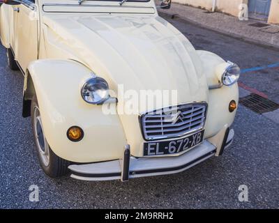 Loriol sur Drome, France - 17 September, 2022: Vintage beige Citroen 2CV with fabric hinged top. Classic car exhibition in Loriol sur Drome, France. Stock Photo