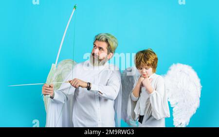 Valentines day angels. Little cupid child boy and father with bow and arrow. Arrows of love. Stock Photo