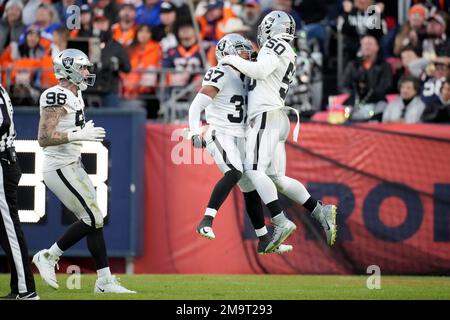 Las Vegas Raiders' Tyler Hall (37) sacks Denver Broncos