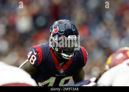 Houston, Texas, USA. 1st Jan, 2023. Jacksonville Jaguars running back  JaMycal Hasty (22) carries the ball while being tackled by Houston Texans  linebacker Christian Harris (48) during the game between the Houston