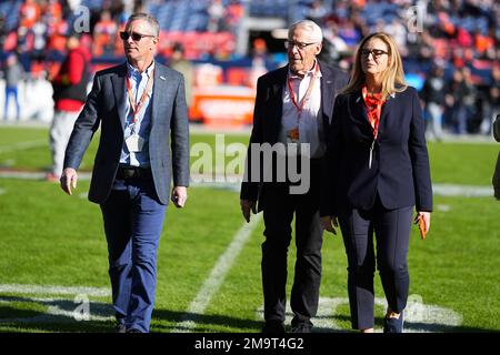 San Francisco 49ers chief executive officer Jed York, middle, talks with Denver  Broncos owners Carrie Walton Penner, left, and Rob Walton before an NFL  football game in Denver, Sunday, Sept. 25, 2022. (