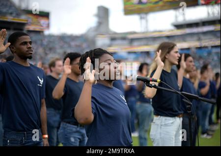 U.S. Air Force recruits are sworn in during halftime on Salute to Service  military appreciation day at an NFL football game between the Jacksonville  Jaguars and the Las Vegas Raiders, Sunday, Nov. 6, 2022, in Jacksonville,  Fla. (AP Photo/Phelan M