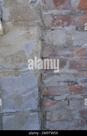 Old house brickwork exposed during renovation Stock Photo