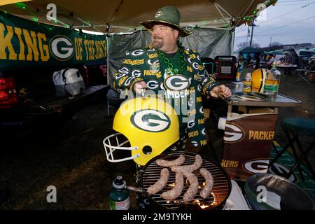 Green Bay Packers fan Larry Weese of Chippewa Falls Wis. cooks