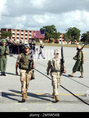 US Marine Corps (USMC) Marines dressed in uniforms for the particular eras, march in the birthday pageant parade, held aboard Marine Corps Recruit Depot (MCRD) Parris Island, South Carolina (SC). Base: USMC Recruit Depot,Parris Island State: South Carolina (SC) Country: United States Of America (USA) Stock Photo