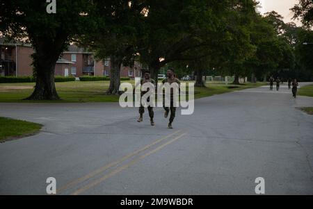 Communication Strategy and Operations Marines with 2d Marine Division and 2d Marine Logistics Group race to the finish line during a workout of the day on Camp Lejeune, North Carolina, May 20, 2022. This workout is in remembrance of Lance Cpl. Jacob A. Hug and Cpl. Sara A. Medina deployed to Kathmandu, Nepal with Joint Task Force 505 shortly after a 7.8 magnitude earthquake struck the country on April 25, 2015. The task force was called upon by the Nepalese Government to provide humanitarian relief shortly after the earthquake. On May 12, another 7.4 magnitude earthquake struck the country and Stock Photo