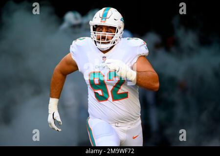 Miami Dolphins defensive tackle Zach Sieler (92) and Cleveland Browns guard  Wyatt Teller (77) exchange jerseys at the end of an NFL football game,  Sunday, Nov. 13, 2022, in Miami Gardens, Fla.