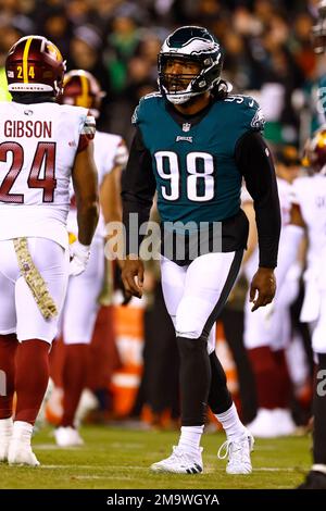 Philadelphia Eagles defensive end Robert Quinn (98) is blocked by