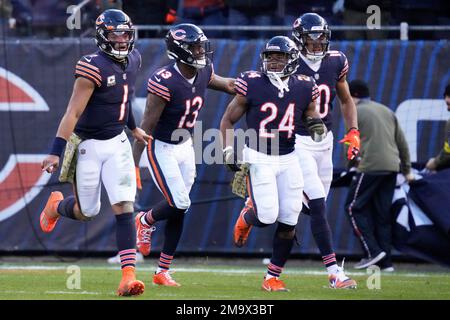 December 24, 2022 - Chicago Bears running back Khalil Herbert (24) takes  off with the ball during NFL football game versus the Buffalo Bills in  Chicago, IL Stock Photo - Alamy