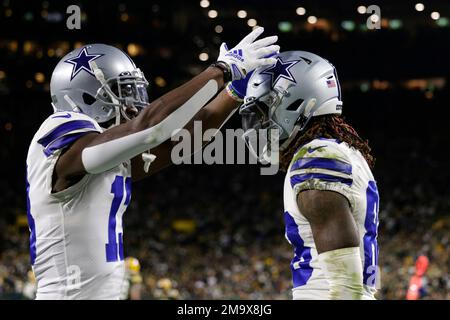 Dallas Cowboys' Michael Gallup, left, and CeeDee Lamb, rightr, celebrate  after Lamb caught a pass for a touchdown during the second half of an NFL  football game against the Green Bay Packers