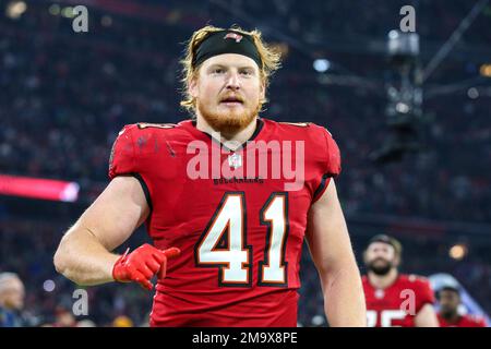 Tampa Bay Buccaneers tight end Ko Kieft (41) walks off the field after an  NFL football game against the Seattle Seahawks on Nov. 13, 2022, in Munich.  The Buccaneers defeated the Seahawks