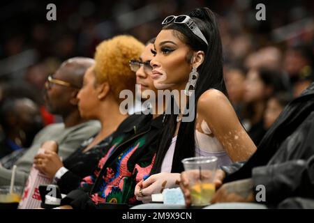 Fashion model Winnie Harlow watches during the second half of an NBA  basketball game between the Washington Wizards and the Utah Jazz, Saturday,  Nov. 12, 2022, in Washington. (AP Photo/Nick Wass Stock