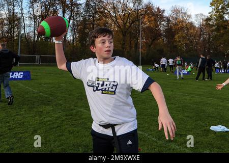 Youth participating in the NFL FLAG football program on Friday, Nov