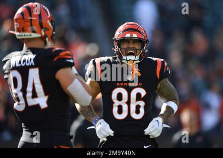 Washington Commanders defensive tackle Benning Potoa'e (79) and Cincinnati  Bengals tight end Devin Asiasi (86) both greet each other after an NFL  preseason football game, Saturday, August 26, 2023 in Landover. (AP