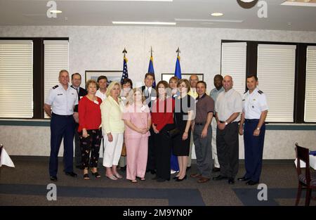 040623-F-2522R-006. [Complete] Scene Caption: Various leaders and citizens of Autauga County in Alabama arrive for a tour of Air University. Front Row (Left to Right): US Air Force (USAF) Colonel (COL) Floyd Carpenter [Brigadier General (sel)], Commander, Air Force Officer Accession and Training Schools (AFOATS); Jennie Prochazka, Prattville Chamber of Commerce; Connie Scott, Autauga County Revenue Office - Mapper; Shannon Smith, Autauga County Probate Office - Probate Clerk; Kathy Evans, Autauga County Probate Office - CHIEF Clerk; Susan Patterson, Bern, Butler,Capilouto Massey, P.C. - Accoun Stock Photo