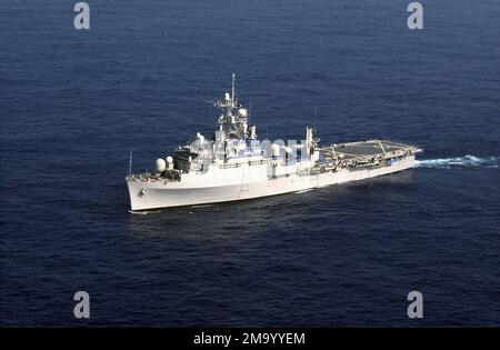 040420-N-9849W-001. [Complete] Scene Caption: The US Navy (USN) Austin Class LPD command ship USS CORONADO (AGF 11) during a routine underway period in the Pacific Ocean. The CORONADO is serving as the temporary command ship for Commander, US Seventh Fleet while the Blue Ridge Class Amphibious Command Ship USS BLUE RIDGE (LCC 19) is in a scheduled dry dock maintenance period. Besides serving as a temporary command ship, CORONADO is also experimenting with a unique manning concept. The crew is made up of Military Sealift Command (MSC) civilian mariners and a small group of Sailors, designed to Stock Photo