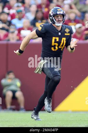 Washington Commanders long snapper Camaron Cheeseman (54) runs during an  NFL preseason football game against the Baltimore Ravens, Monday, August  21, 2023 in Landover. (AP Photo/Daniel Kucin Jr Stock Photo - Alamy