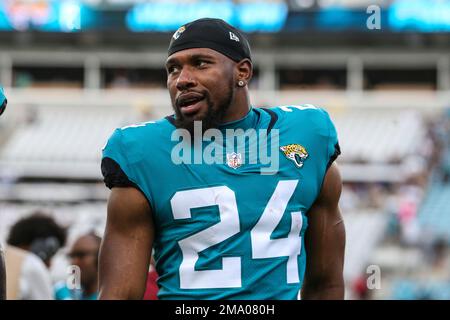 Jacksonville Jaguars running back Snoop Conner, left, runs during a ...