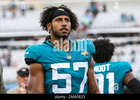 Jacksonville Jaguars linebacker Caleb Johnson (57) during the national  anthem before an NFL pre-season football game against the Miami Dolphins,  Saturday, Aug. 26, 2023, in Jacksonville, Fla. The Jaguars defeated the  Dolphins