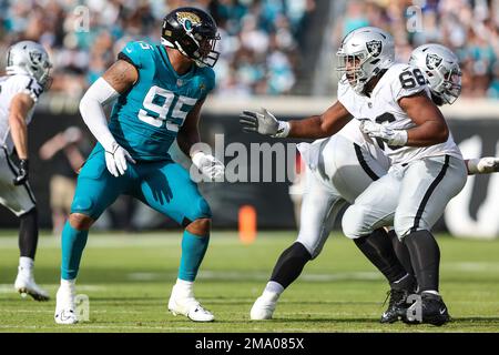 Las Vegas Raiders guard Richie Incognito (64) speaks to Los Angeles Rams  vice president of communications Artis Twyman during training camp on  Wednesd Stock Photo - Alamy