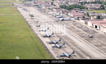 A aerial view of aircraft static displays on flight line during the opening of Friendship Festival 2022, at Yokota Air Base, Japan, May 22, 2022. The two-day festival was an opportunity for visitors to learn more about the U.S. and Japan bilateral partnership, while strengthening the bonds between Yokota and the local communities. Yokota was able to host the event with the support of Japan Self-Defense Force, sister services and the local community. Stock Photo