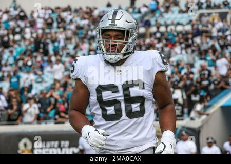 Las Vegas Raiders guard Richie Incognito (64) speaks to Los Angeles Rams  vice president of communications Artis Twyman during training camp on  Wednesd Stock Photo - Alamy