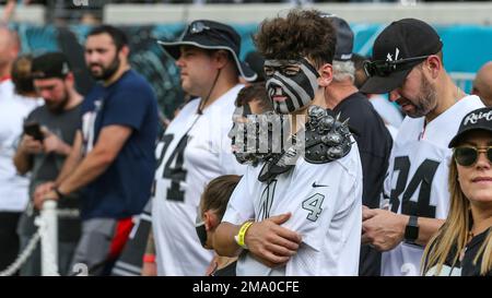 Fans wear rain gear prior to an NFL football game between the New York Jets  and the Buffalo Bills, Sunday, Dec. 11, 2022, in Orchard Park, N.Y. (AP  Photo/Adrian Kraus Stock Photo 