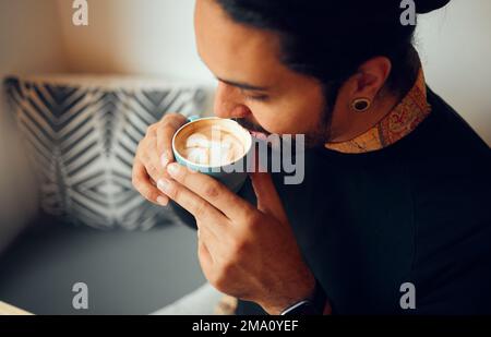 Man, coffee and hands drinking or smelling aroma of caffeine, mocha or cappuccino relaxing at home. Happy male, person or guy holding a hot or warm Stock Photo