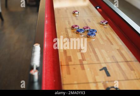 Shuffleboard american games sport recreation Stock Photo