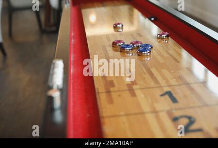 Shuffleboard american games sport recreation Stock Photo