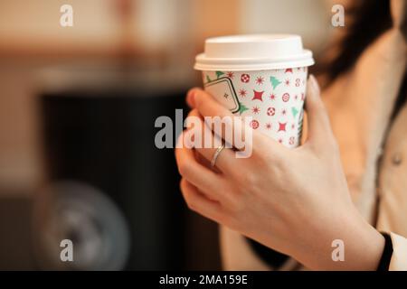 girl holding coffee cup close up Stock Photo