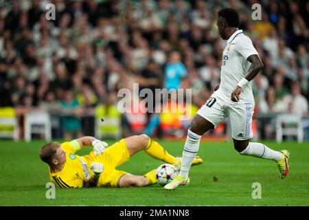Celtic's goalkeeper Joe Hart falls on the ground as Real Madrid's Vinicius  Junior follows the ball during the Champions League Group F soccer match  between Real Madrid and Celtic at the Santiago Bernabeu stadium in Madrid,  Spain, Wednesday, Nov. 2