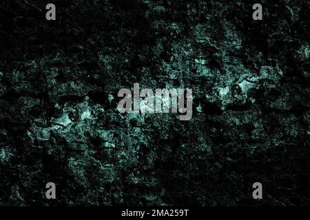 Grungy rough grunge textured dark wall surface for background Stock Photo