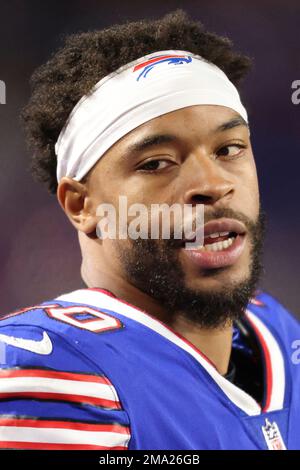 Buffalo Bills cornerback Dane Jackson (30) breaks up a pass intended for  Cincinnati Bengals wide receiver Ja'Marr Chase (1) during the first quarter  of an NFL division round football game, Sunday, Jan.