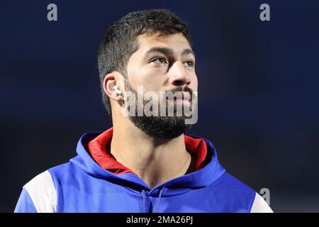 Buffalo Bills defensive end AJ Epenesa (57) reacts during the first half an  NFL football game against the New England Patriots, Thursday, Dec. 1, 2022,  in Foxborough, Mass. (AP Photo/Greg M. Cooper