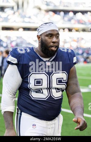 Arlington, Texas, USA. 11th Dec, 2022. On 4th and 3, Dallas Cowboys  defensive tackle NEVILLE GALLIMORE (96) and Dallas Cowboys linebacker  ANTHONY BARR (42) combine to stop Houston Texans quarterback JEFF DRISKEL (