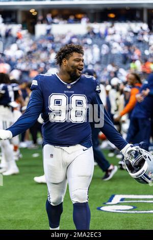 Cincinnati, OH, USA. 13th Dec, 2020. Dallas Cowboys defensive tackle  Neville Gallimore #96 breaks through between Cincinnati Bengals offensive  guard Quinton Spain #67 and Cincinnati Bengals offensive tackle Bobby Hart  #68 during