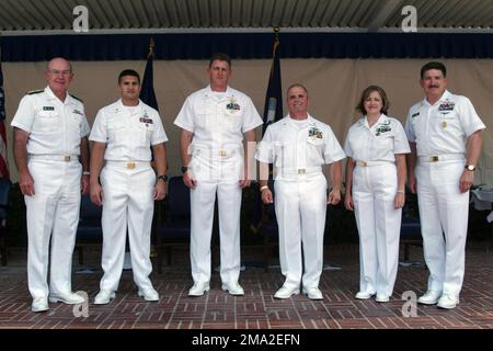 040722-N-2383B-128. [Complete] Scene Caption: The US Navy's (USN) Sailors of the Year pose for a photo between USN Admiral (ADM) Vern Clark (left), CHIEF of Naval Operations (CNO) and USN MASTER CHIEF PETTY Officer of the Navy (MCPON) Terry Scott (right) at the conclusion of a Pentagon courtyard announcement ceremony. The recipients were just meritoriously promoted to CHIEF PETTY Officer (CPO) after an arduous competition against hundreds of other contenders. The Sailors (left to right): USN CHIEF Aviation Ordnanceman (AOC) Charles Bryant, Atlantic Fleet Sea Sailor of the Year; USN CHIEF Intel Stock Photo