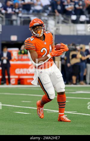 Chicago Bears running back Khalil Herbert (24) warms up prior to