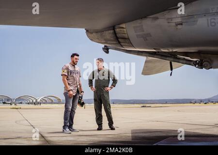 U.S. Marines with Marine Fighter Attack Squadron 323, 3rd Marine Aircraft Wing (MAW), are visited by San Diego Padres pitchers, Sean Manaea and Joe Musgrove, on Marine Corps Air Station Miramar, California, May 23, 2022. Manaea and Musgrove were able to operate the F/A-18 Hornet aircraft simulator, learn about aircraft equipment and flight operations, and meet with 3rd MAW Marines. Stock Photo