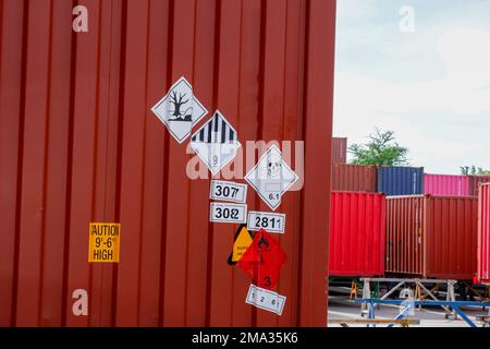 Dangerous stickers attached to containers Stock Photo
