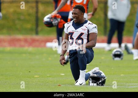 Denver Broncos running back Devine Ozigbo (36) catches the ball