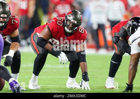 Tampa Bay Buccaneers guard Nick Leverett (60) prays before an NFL football  game against the Atlanta Falcons, Sunday, Dec. 5, 2021, in Atlanta. The Tampa  Bay Buccaneers won 30-17. (AP Photo/Danny Karnik