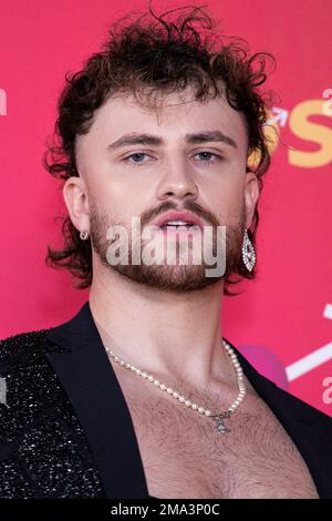 Max Hovey poses for photographers upon arrival for the premiere of the