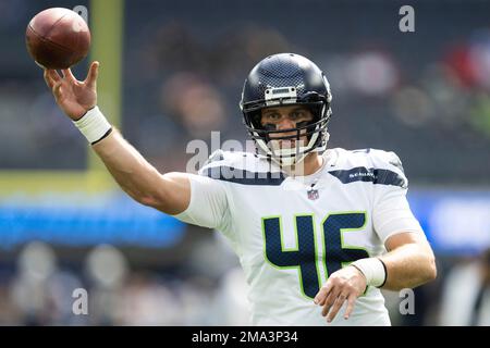 Seattle Seahawks long snapper Carson Tinker (46) warms up wearing