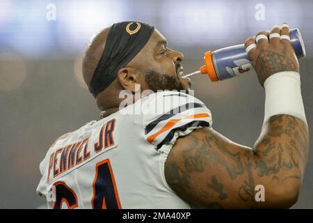 Chicago Bears defensive tackle Mike Pennel Jr. (64) speaks to Atlanta  Falcons players after an NFL football game, Sunday, Nov. 20, 2022, in  Atlanta. The Atlanta Falcons won 27-24. (AP Photo/Brynn Anderson