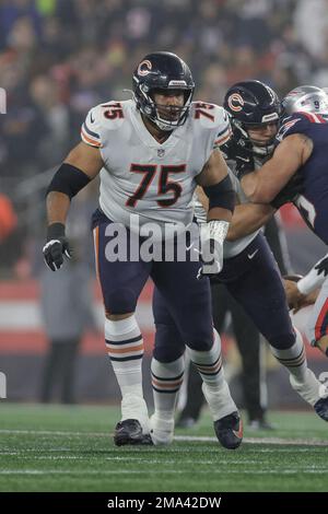 Chicago Bears offensive tackle Larry Borom (75) looks on during the first  half of an NFL football game against the Washington Commanders, Thursday,  Oct. 13, 2022, in Chicago. (AP Photo/Kamil Krzaczynski Stock